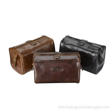 Framed toiletry bag, made of luxurious vegetable tanned Italian leather